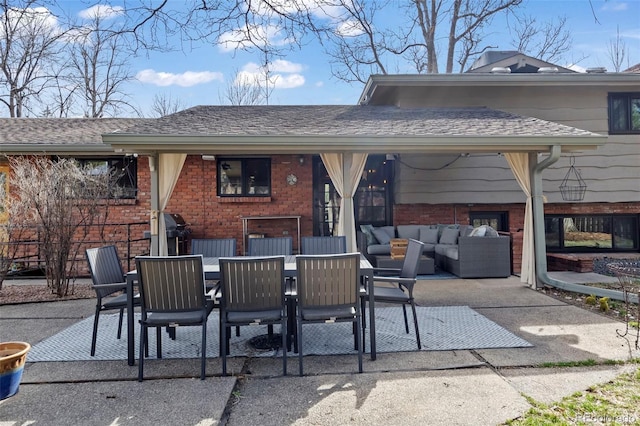 view of patio featuring outdoor dining space and an outdoor hangout area