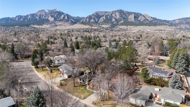 birds eye view of property featuring a mountain view and a residential view