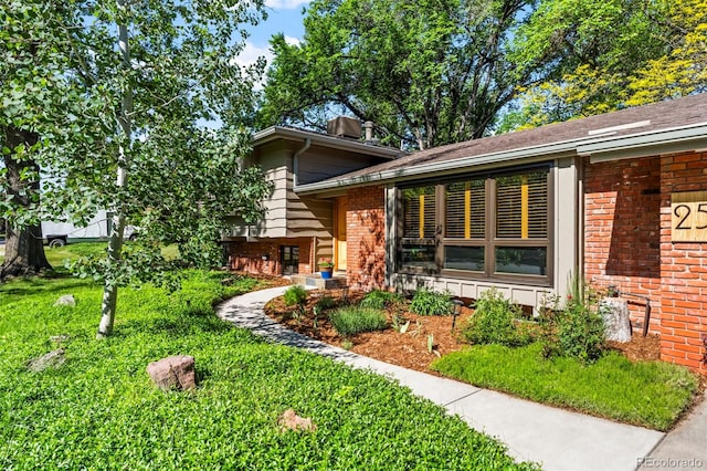 255 Kiowa Pl, Boulder, CO 80303 - view of front of property featuring brick siding and a front yard
