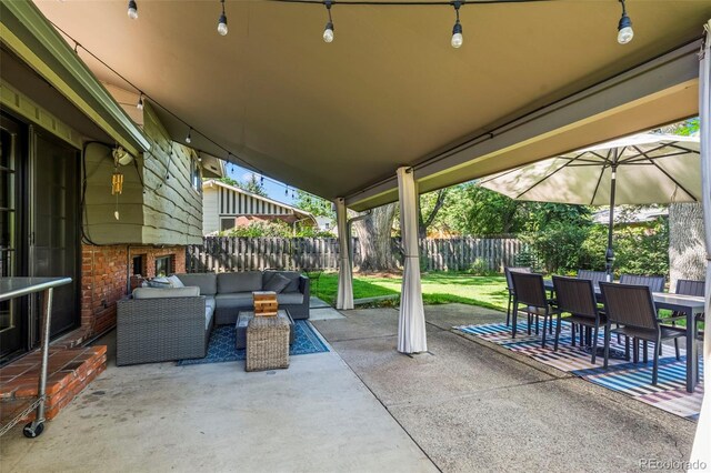 255 Kiowa Pl, Boulder, CO 80303 - fenced backyard with a patio, outdoor lounge area, and outdoor dining area