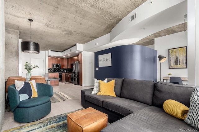 1700 Bassett St Unit 409, Denver, CO 80202 - living room with light wood-style floors