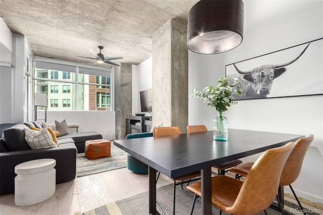 1700 Bassett St Unit 409, Denver, CO 80202 - dining area featuring wood finished floors and a ceiling fan