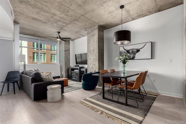 1700 Bassett St Unit 409, Denver, CO 80202 - dining room with light wood finished floors and ceiling fan