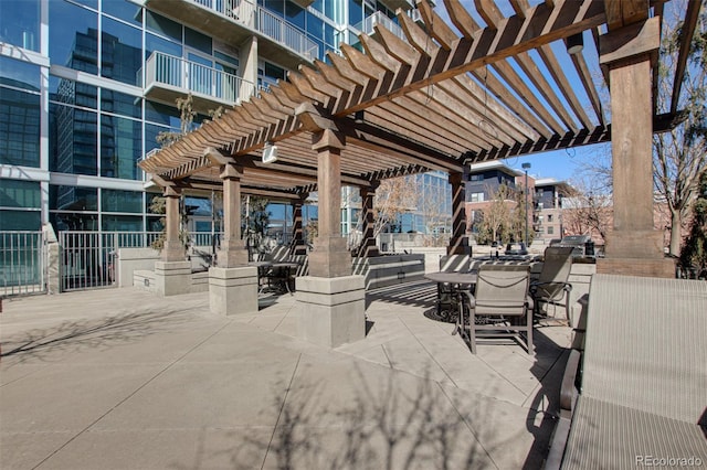 1700 Bassett St Unit 409, Denver, CO 80202 - view of patio featuring a pergola and outdoor dining area