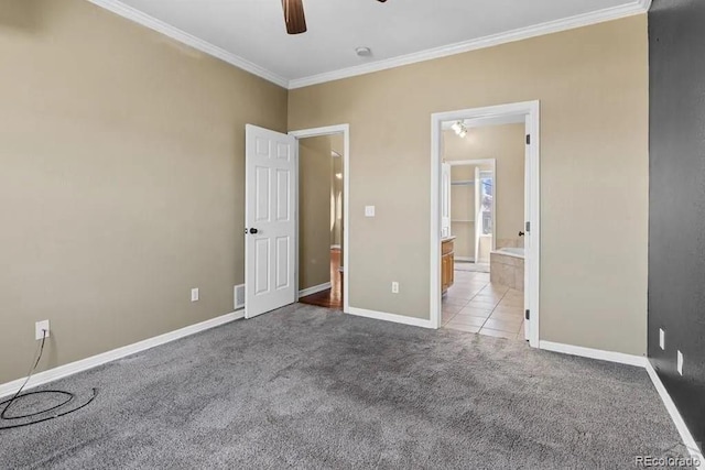 unfurnished bedroom featuring ceiling fan, crown molding, and light colored carpet