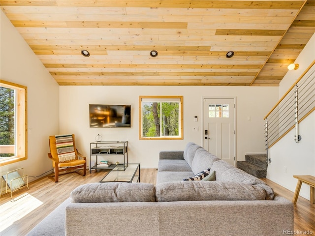 2946 Middle Fork Vis, Fairplay, CO 80440 - living area with wood ceiling, stairs, vaulted ceiling, and wood finished floors