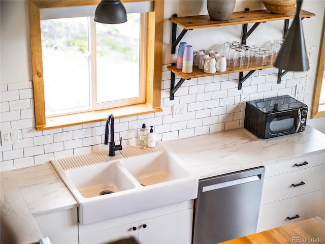 2946 Middle Fork Vis, Fairplay, CO 80440 - kitchen featuring stainless steel dishwasher, open shelves, decorative backsplash, white cabinets, and black microwave