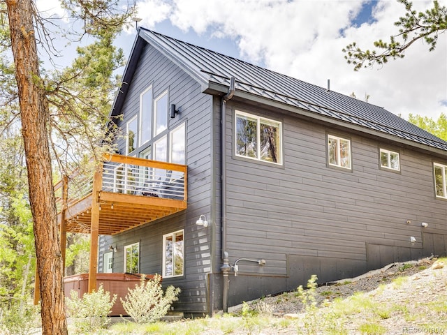 2946 Middle Fork Vis, Fairplay, CO 80440 - view of side of property with a standing seam roof, a metal roof, and a deck
