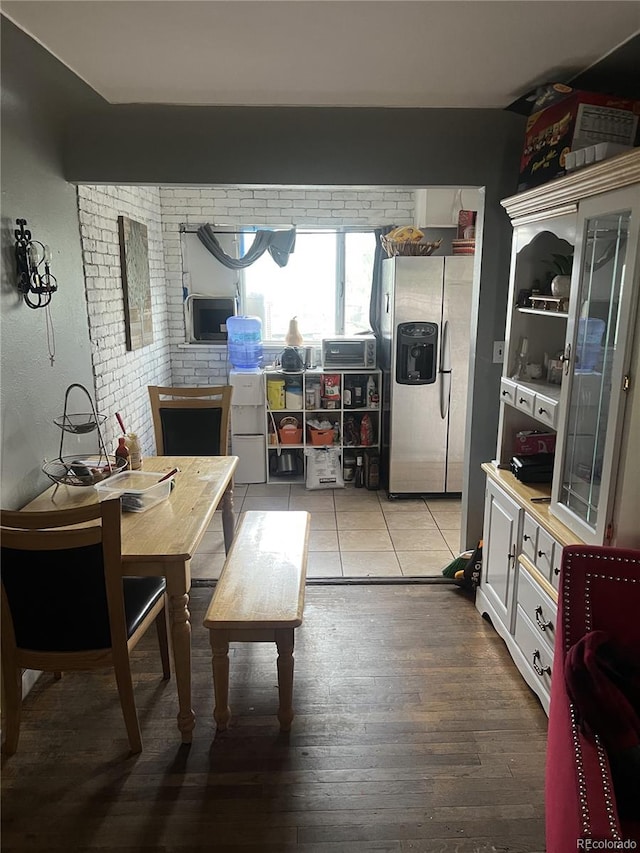 188 S Dale Ct, Denver, CO 80219 - dining space with light wood finished floors