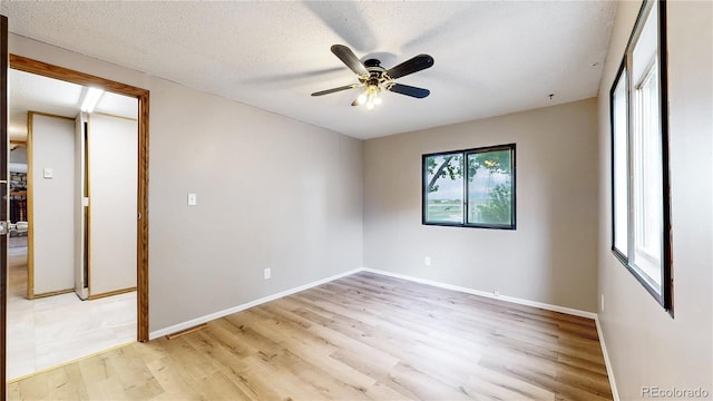 8509 Colorado Ct, Denver, CO 80229 - unfurnished room with light wood-type flooring, ceiling fan, and baseboards