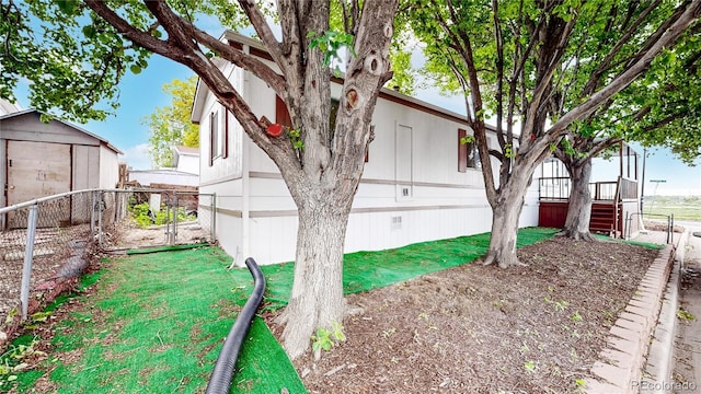 8509 Colorado Ct, Denver, CO 80229 - view of side of home with stairway and crawl space