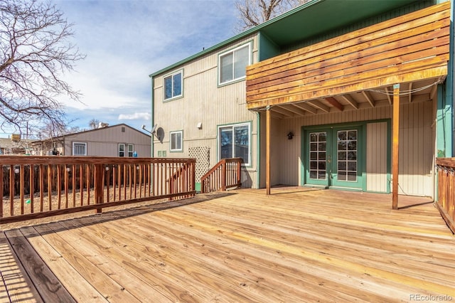 wooden terrace featuring french doors