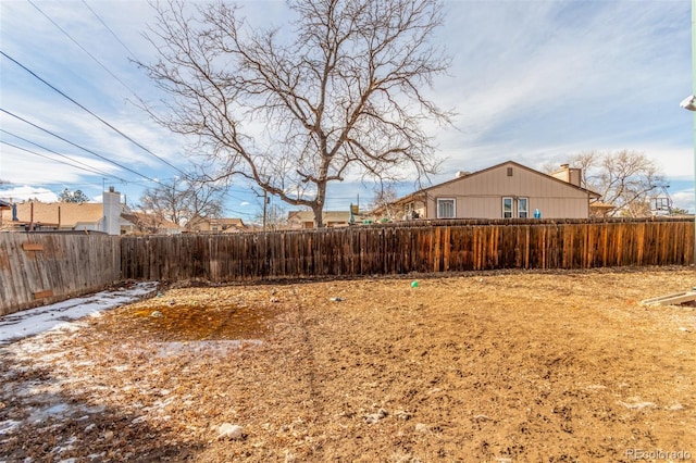 view of yard featuring a fenced backyard