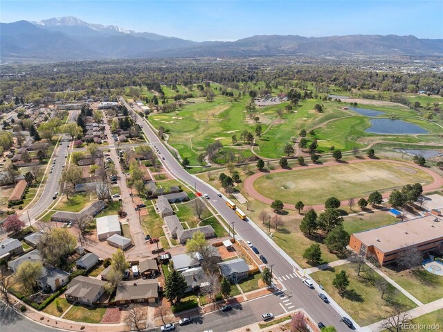 1638 N Foote Ave, Colorado Springs, CO 80909 - birds eye view of property with a water and mountain view, view of golf course, and a residential view