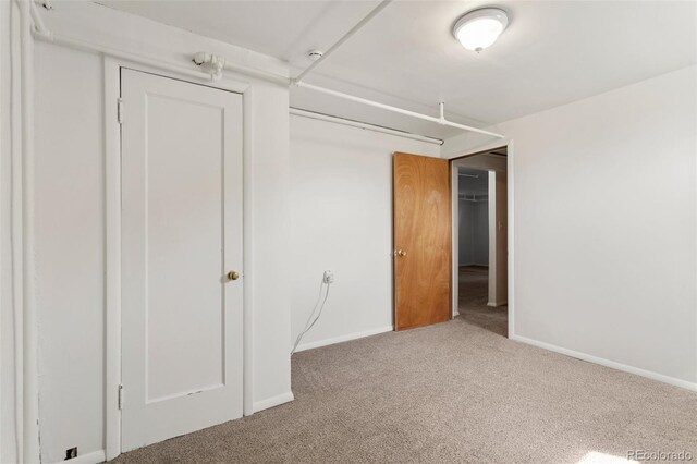 1638 N Foote Ave, Colorado Springs, CO 80909 - unfurnished bedroom with baseboards and carpet