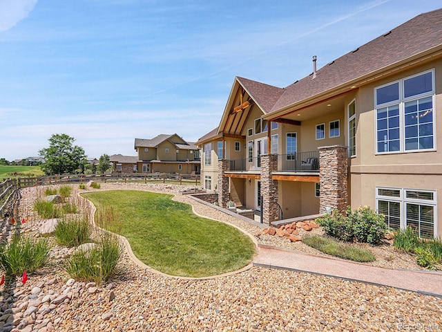 2131 Driver Ln, Erie, CO 80516 - view of yard with a balcony