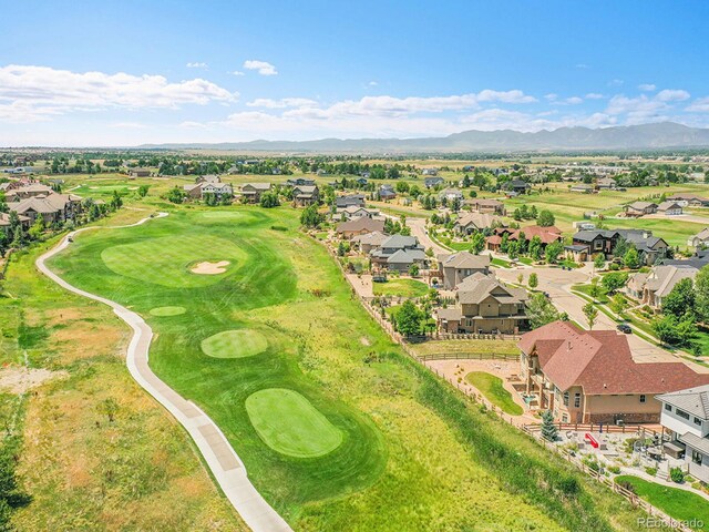 2131 Driver Ln, Erie, CO 80516 - aerial view of residential area with a mountainous background and a golf course