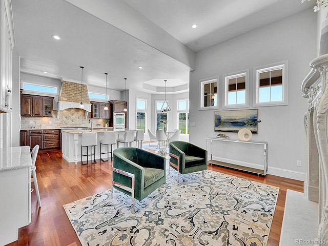 2131 Driver Ln, Erie, CO 80516 - living room featuring dark wood-type flooring and recessed lighting