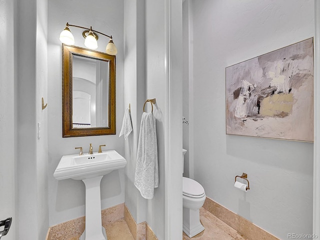 2131 Driver Ln, Erie, CO 80516 - half bathroom with toilet and baseboards