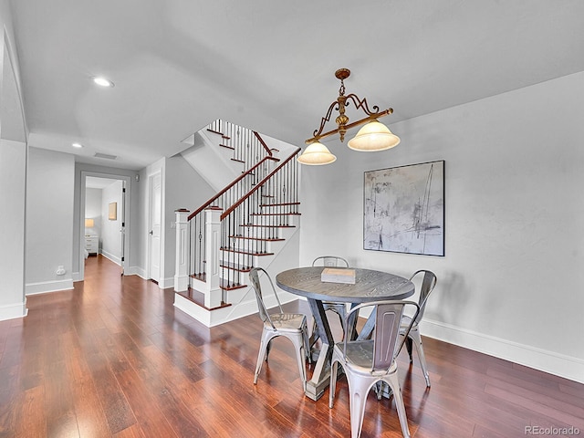 2131 Driver Ln, Erie, CO 80516 - dining room featuring stairs, wood finished floors, and recessed lighting