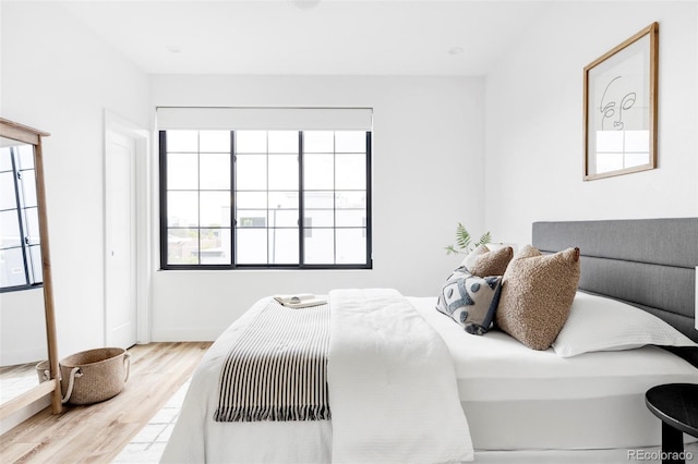 bedroom featuring light hardwood / wood-style floors