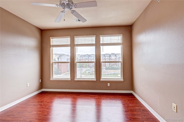10184 Park Meadows Dr Unit 1317, Lone Tree, CO 80124 - empty room featuring dark wood-type flooring and a ceiling fan