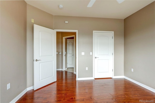 10184 Park Meadows Dr Unit 1317, Lone Tree, CO 80124 - unfurnished bedroom featuring wood finished floors and a ceiling fan