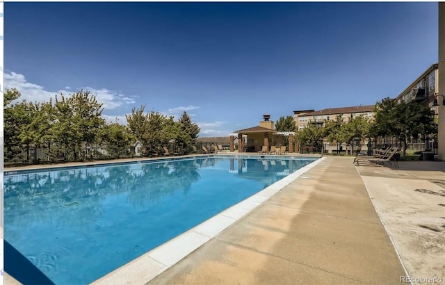 10184 Park Meadows Dr Unit 1317, Lone Tree, CO 80124 - community pool with a patio area