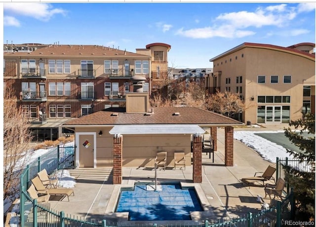 10184 Park Meadows Dr Unit 1317, Lone Tree, CO 80124 - back of property with a patio and a community pool