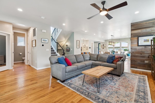 4220 Quitman St, Denver, CO 80212 - living area featuring light wood-style floors, stairs, a ceiling fan, and recessed lighting