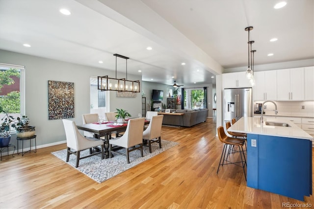 4220 Quitman St, Denver, CO 80212 - dining area with light wood-type flooring and recessed lighting