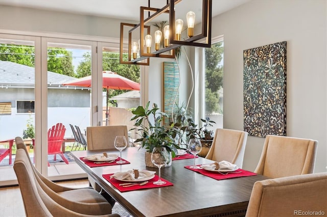 4220 Quitman St, Denver, CO 80212 - dining space with healthy amount of natural light and a chandelier