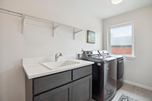 4220 Quitman St, Denver, CO 80212 - washroom featuring washing machine and clothes dryer and cabinet space