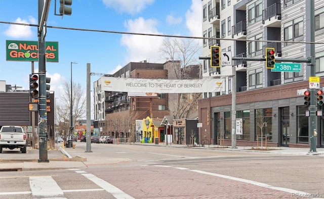 4220 Quitman St, Denver, CO 80212 - view of asphalt street featuring traffic lights, sidewalks, curbs, street lighting, and traffic signs