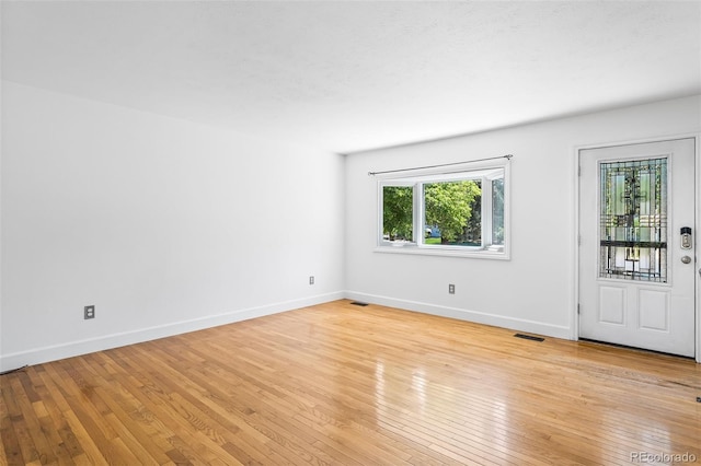 12829 E Nevada Ave, Aurora, CO 80012 - unfurnished room with light wood-type flooring and baseboards