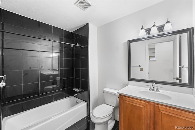 12829 E Nevada Ave, Aurora, CO 80012 - full bath with toilet, vanity, and shower / bathtub combination