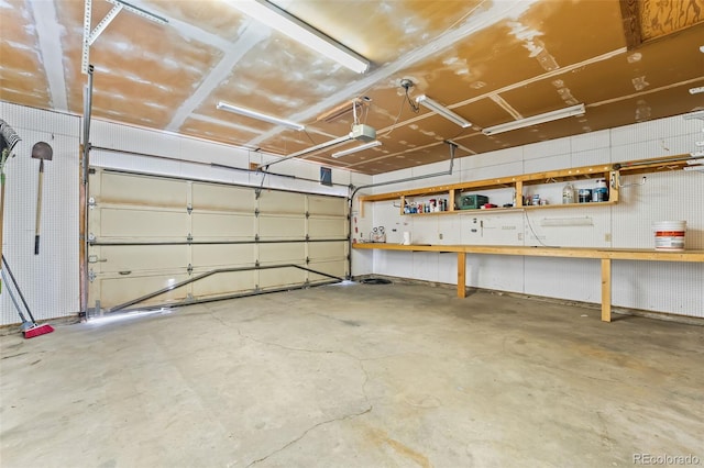 12829 E Nevada Ave, Aurora, CO 80012 - garage featuring a garage door opener
