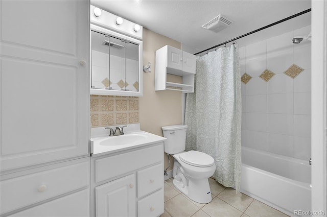 bathroom with shower / bath combo, visible vents, toilet, tile patterned flooring, and vanity