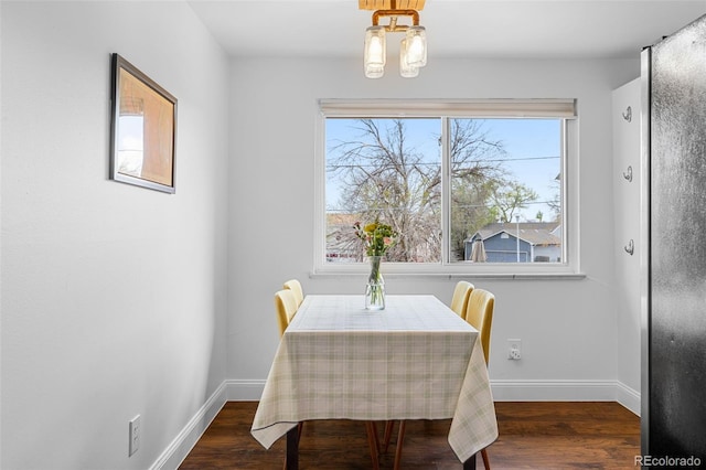 4544 W 65th Ave, Arvada, CO 80003 - dining room with wood finished floors and baseboards