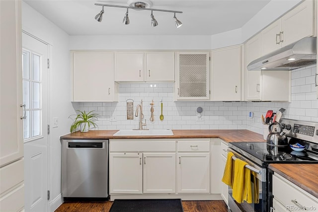 4544 W 65th Ave, Arvada, CO 80003 - kitchen featuring a sink, stainless steel appliances, white cabinetry, butcher block countertops, and under cabinet range hood