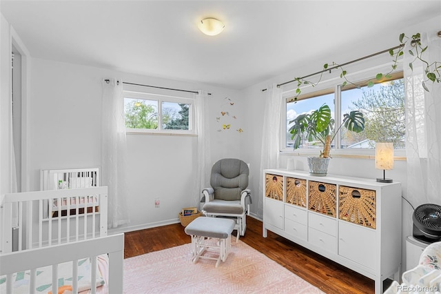 4544 W 65th Ave, Arvada, CO 80003 - bedroom featuring baseboards and wood finished floors