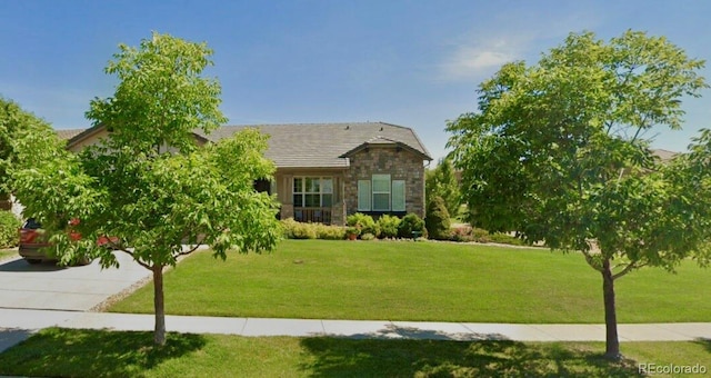 16550 Antero Cir, Broomfield, CO 80023 - view of front of home with a front yard and stone siding