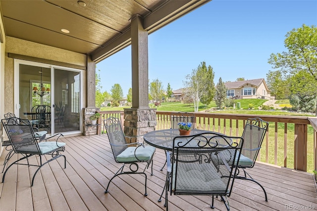 16550 Antero Cir, Broomfield, CO 80023 - wooden deck with outdoor dining space and a residential view