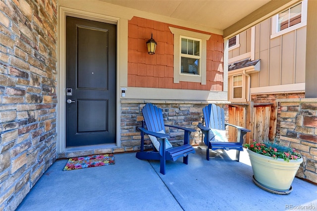 13713 Raritan Ln, Broomfield, CO 80023 - view of exterior entry with stone siding and board and batten siding
