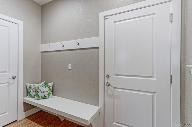 13713 Raritan Ln, Broomfield, CO 80023 - mudroom with light wood-style flooring and a textured wall