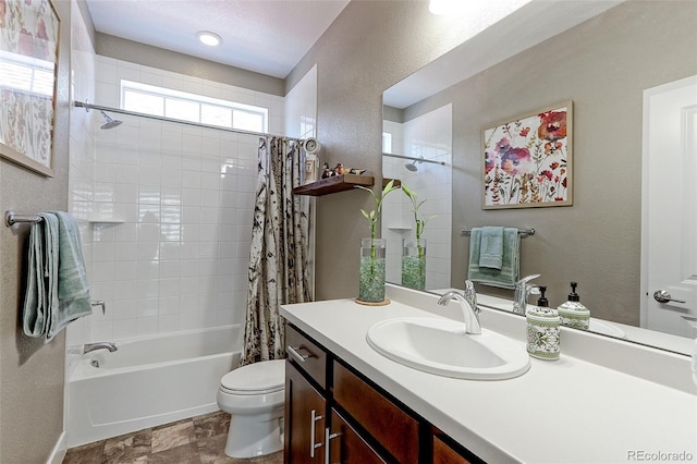 13713 Raritan Ln, Broomfield, CO 80023 - full bathroom with shower / bath combo with shower curtain, vanity, and a textured wall