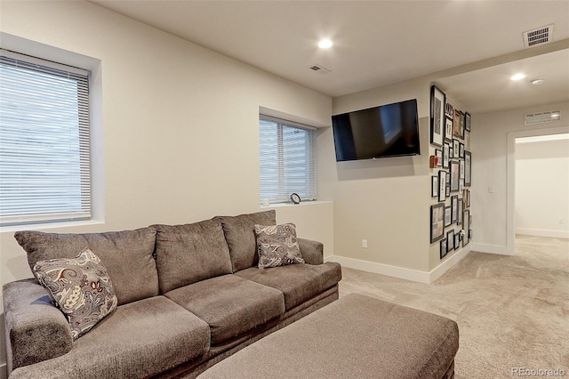 13713 Raritan Ln, Broomfield, CO 80023 - living area featuring light carpet, plenty of natural light, and recessed lighting