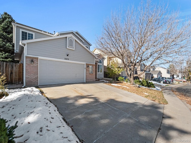 view of side of home with a garage