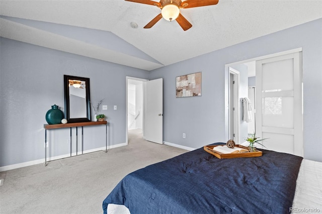 bedroom featuring light carpet, vaulted ceiling, and ceiling fan