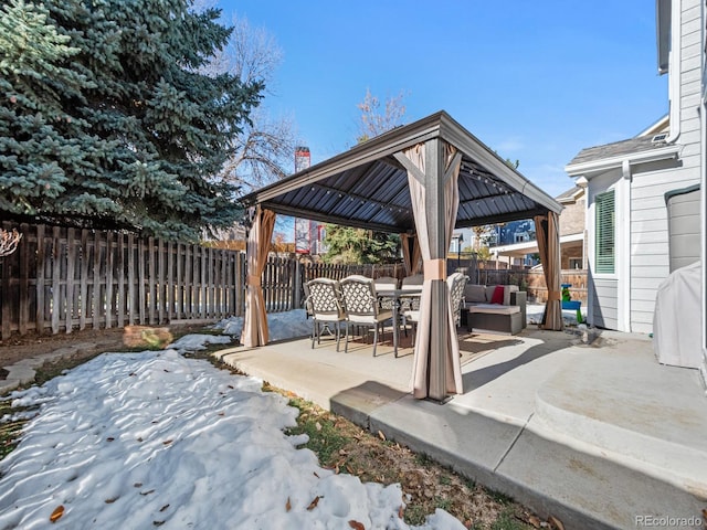 view of patio / terrace with outdoor lounge area and a gazebo